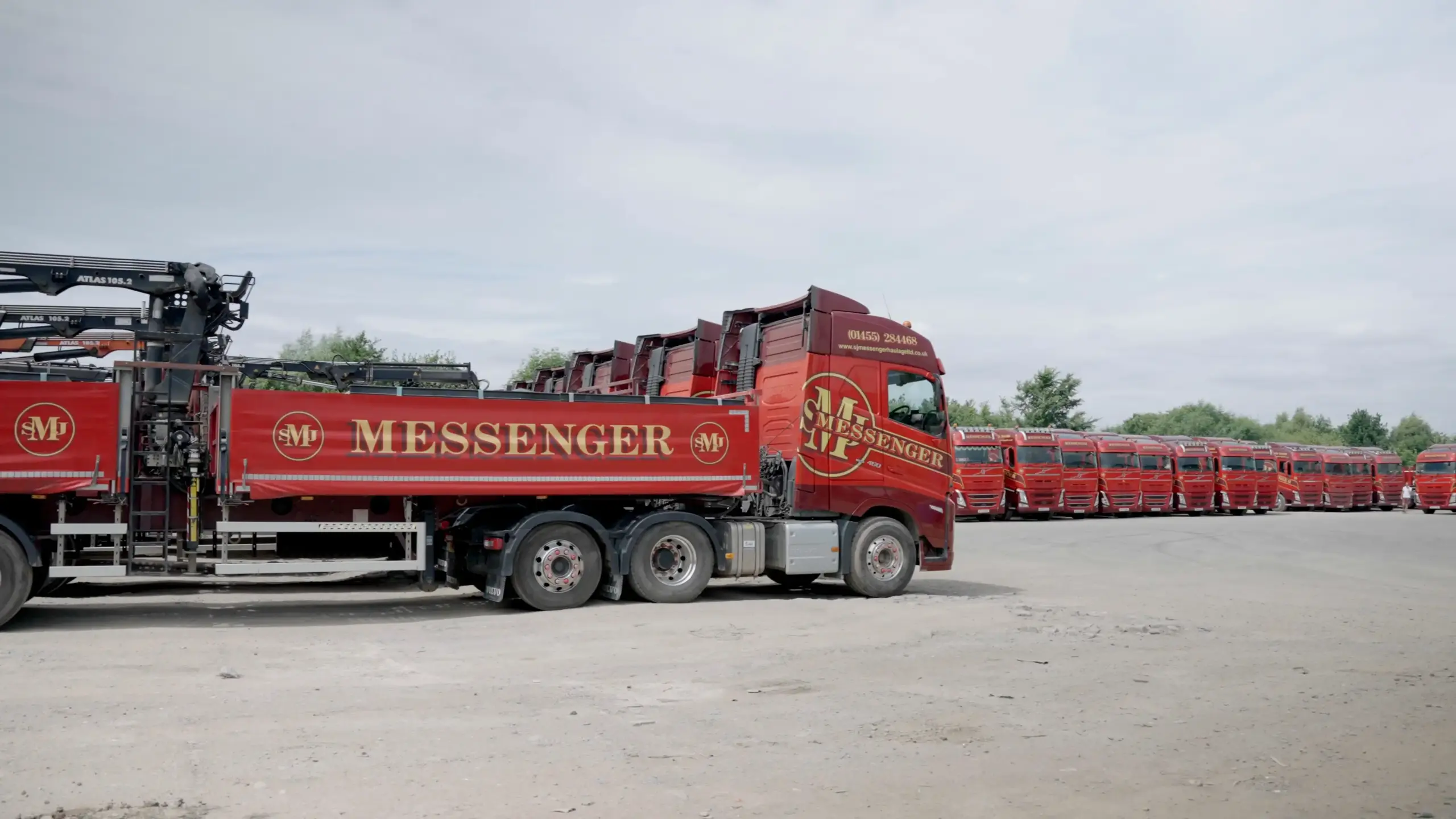 SJ Messenger trucks parked in the forecourt